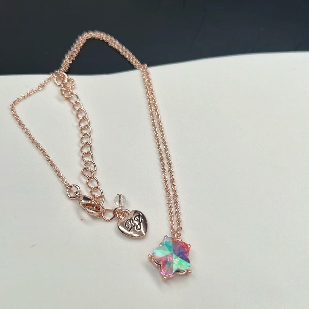 Betsy Johnson, fruity pedals star necklace